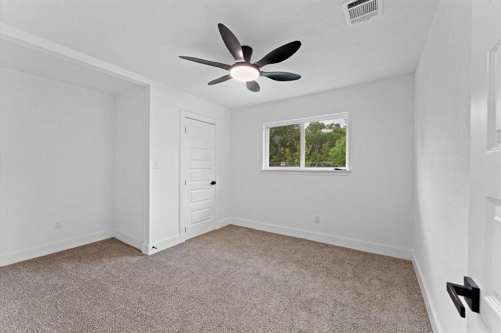 Spacious second bedroom with fresh updates