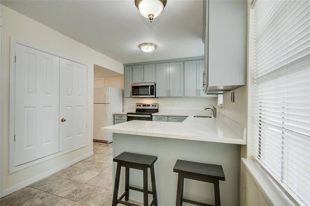 Sun-drenched kitchen nook perfect for casual meals or morning coffee.