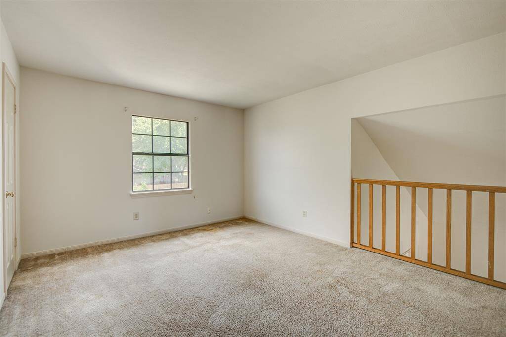 Alternate view overlooking the dining area and backyard, with plenty of natural light and versatile use options.
