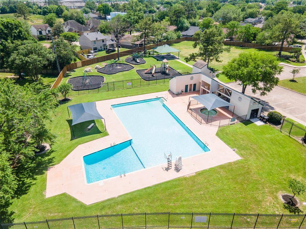 Enjoy summer days at the neighborhood pool and playground—just one street over from your front door.