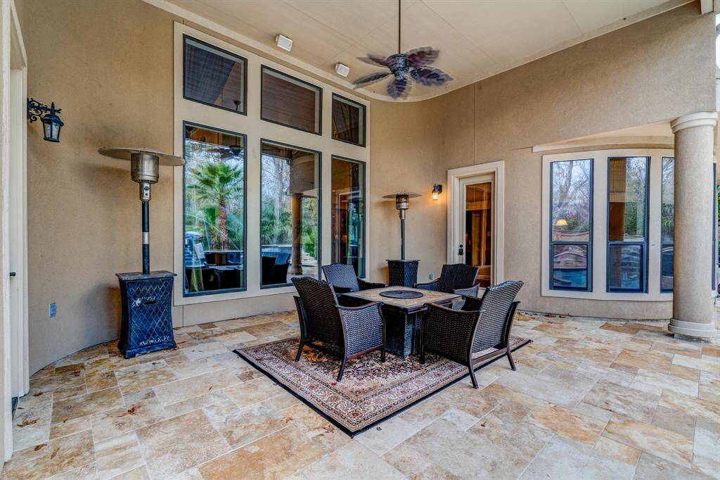 Dining al fresco may become a daily event with a covered patio mimicking high-end resorts!