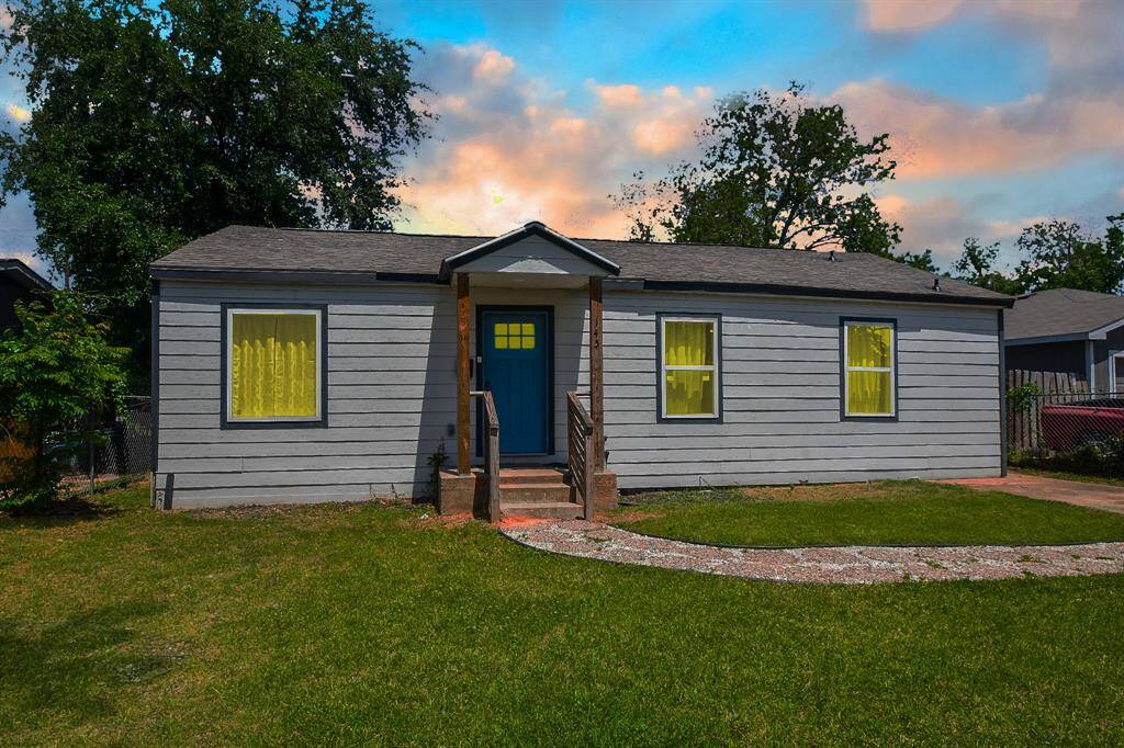Welcome Home to 145 Owens Street. The well-manicured stone and pebble side walk will lead you to the front door.