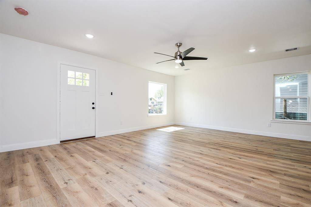 Natural sunlight and an open concept floorplan with beautiful floors and color palette will grace you as you enter the home.