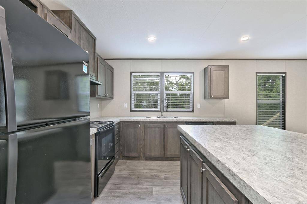Utility Room with Storage and Access to Back porch
