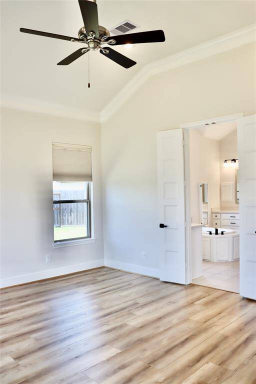 Another view of the primary bedroom