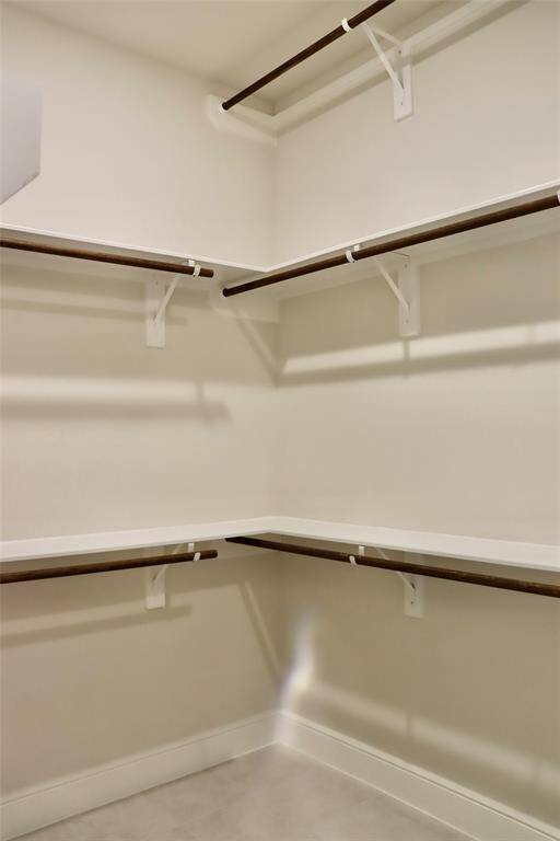 1 of the 2 walk in closets in the primary bathroom