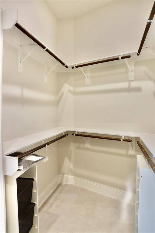 1 of the 2 walk in closets of the primary bathroom