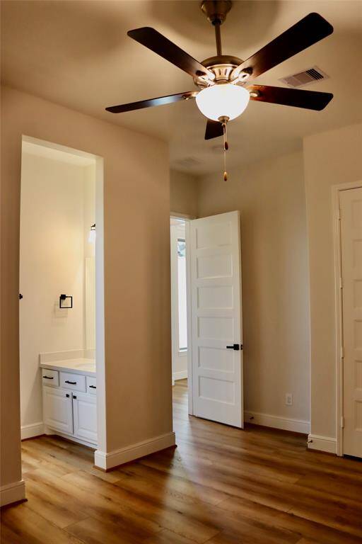 1 of the 2 bedrooms that are connected by a jack and Jill