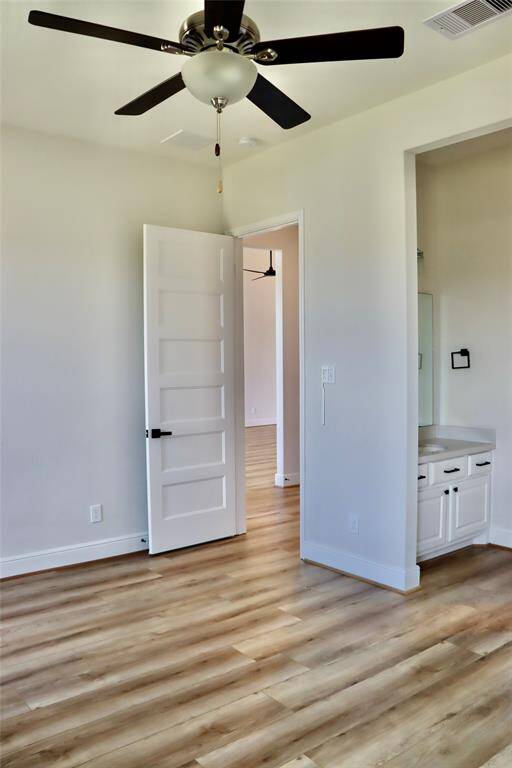 Another view of 1 of the 2 bedrooms connected by a jack and Jill with the single closet