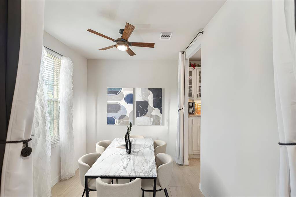 This dining room could also be used as an office/ additional sitting area as there is a huge eating area in the kitchen.  Digitally staged