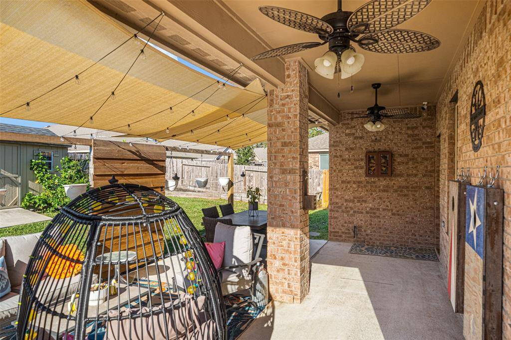 What a great area to relax and play darts! Dart Board is included with your new home.