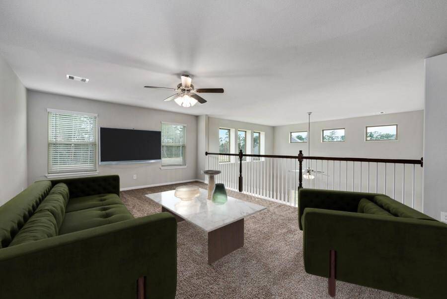 Here is another option for the game room, it can be an upstairs family area as it is located off to the side away from the bedrooms.  Digitally staged.