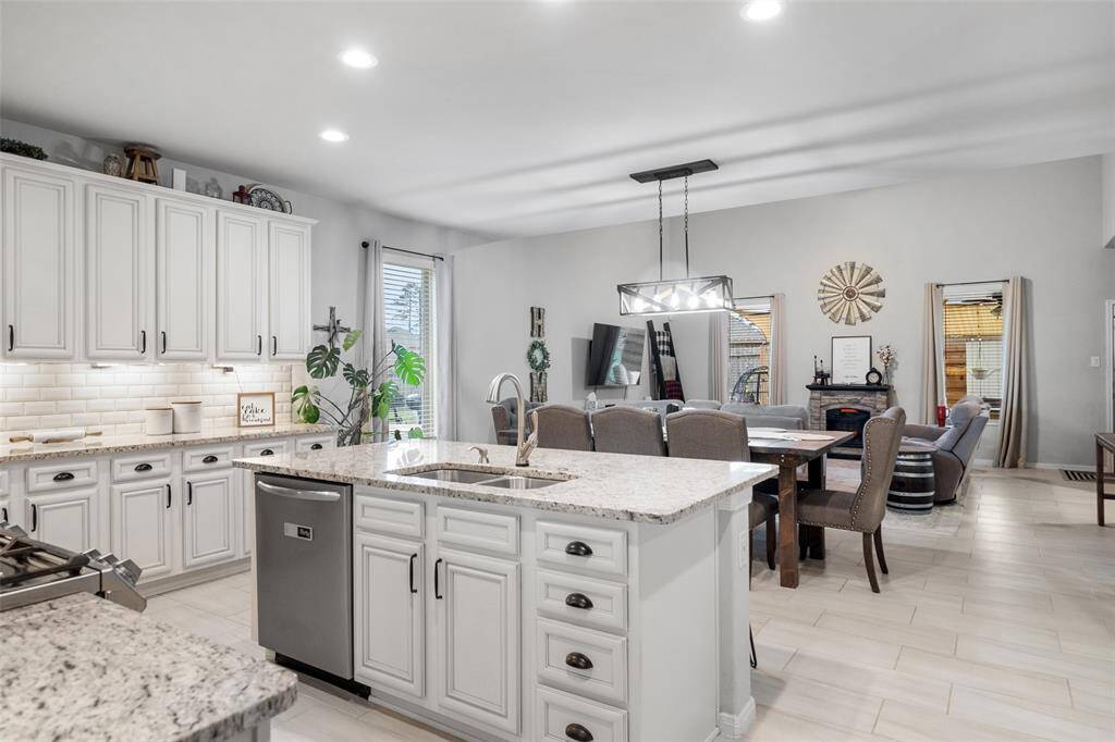There is ample counter space in this well appointed kitchen