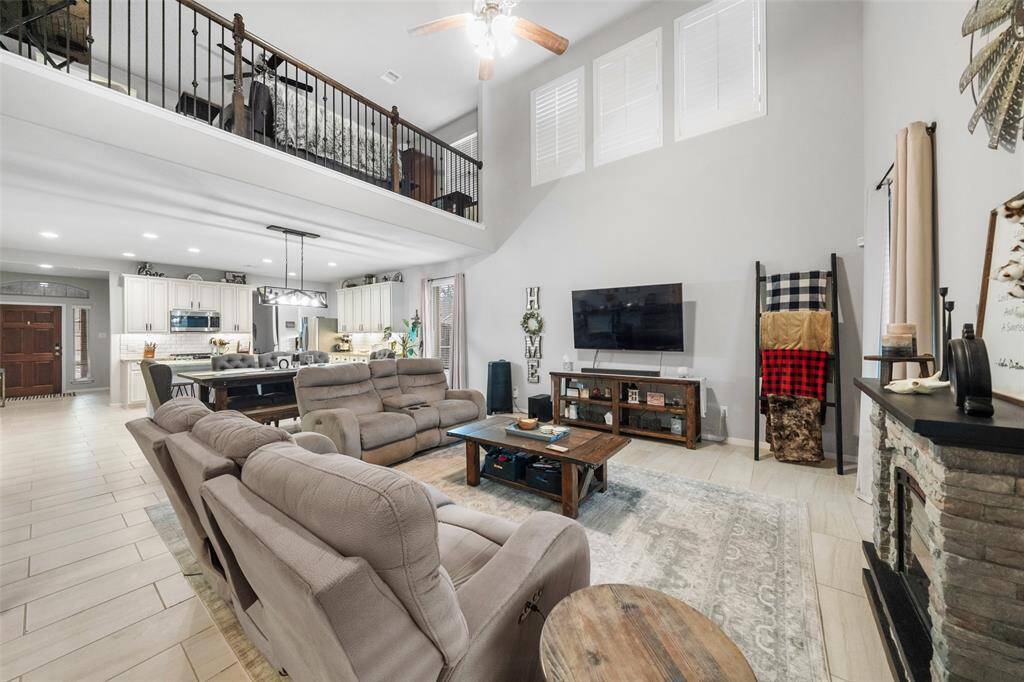 What a beautiful look with the wrought iron balusters.