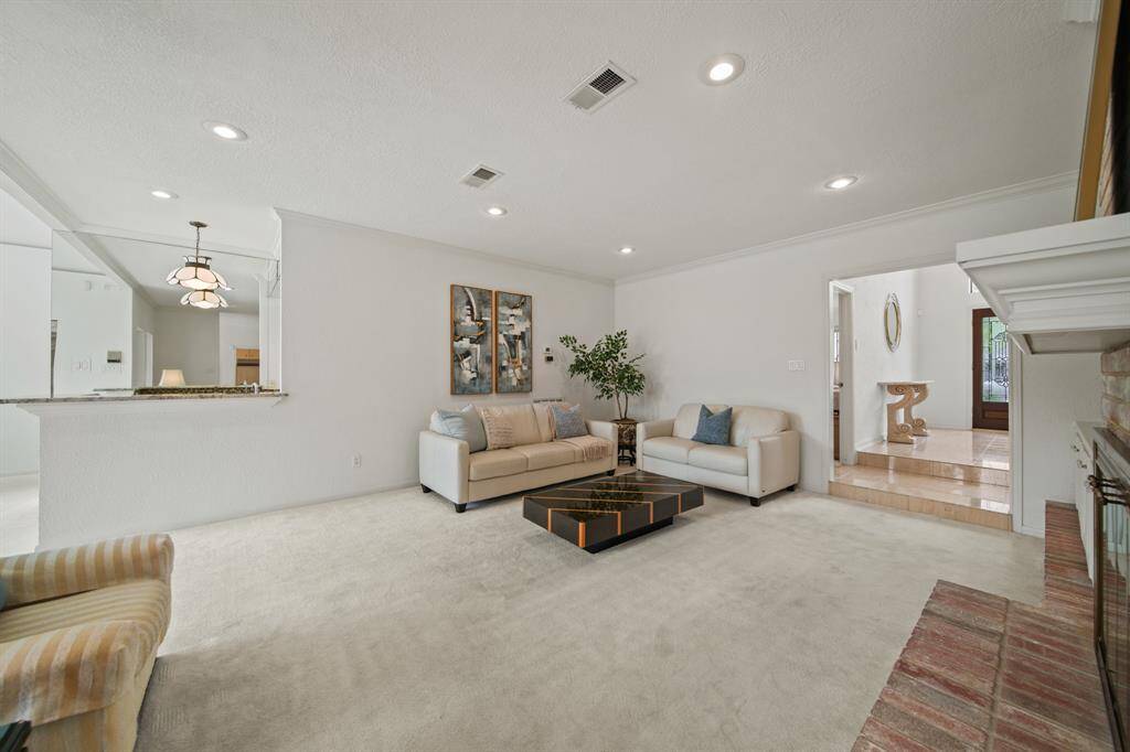 There are recessed lights throughout the downstairs. Upgraded carpet is very plush.