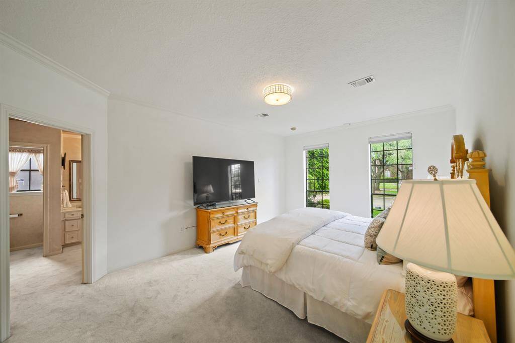 Another view of the primary bedroom...