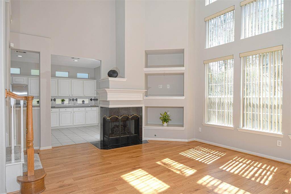Corner fireplace with porcelain gas logs. Several art nooks to display your treasures.