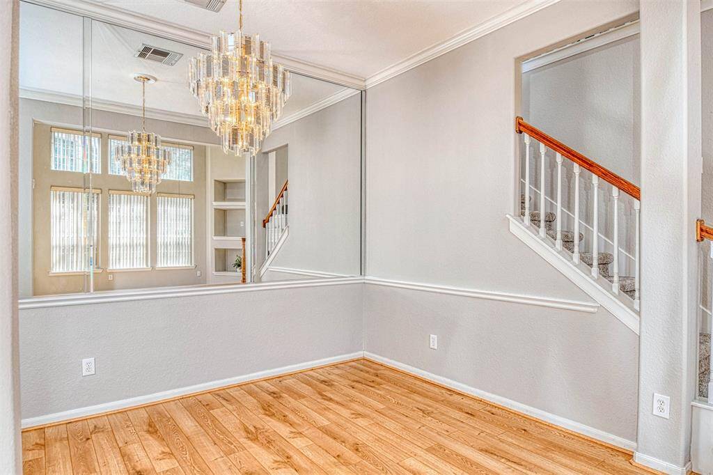 Formal dining also has hard wood floors. Fresh paint throughout