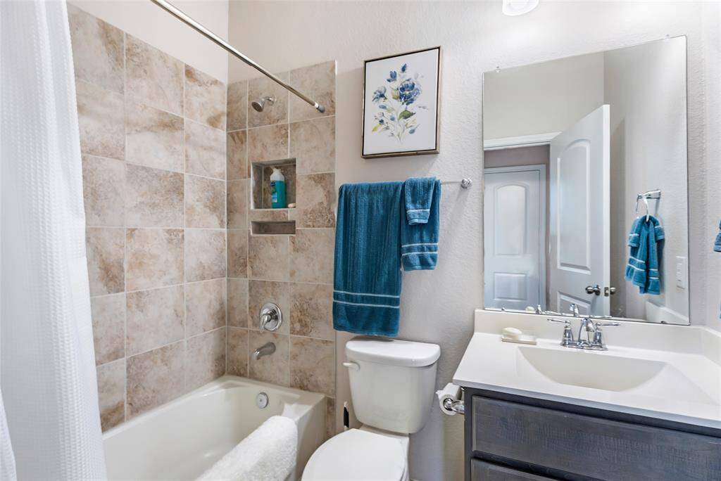 Full spare bath conveniently located at the front of the home adjacent to the flex space