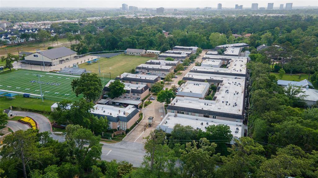 Greenery surrounding the complex with a private school nearby.