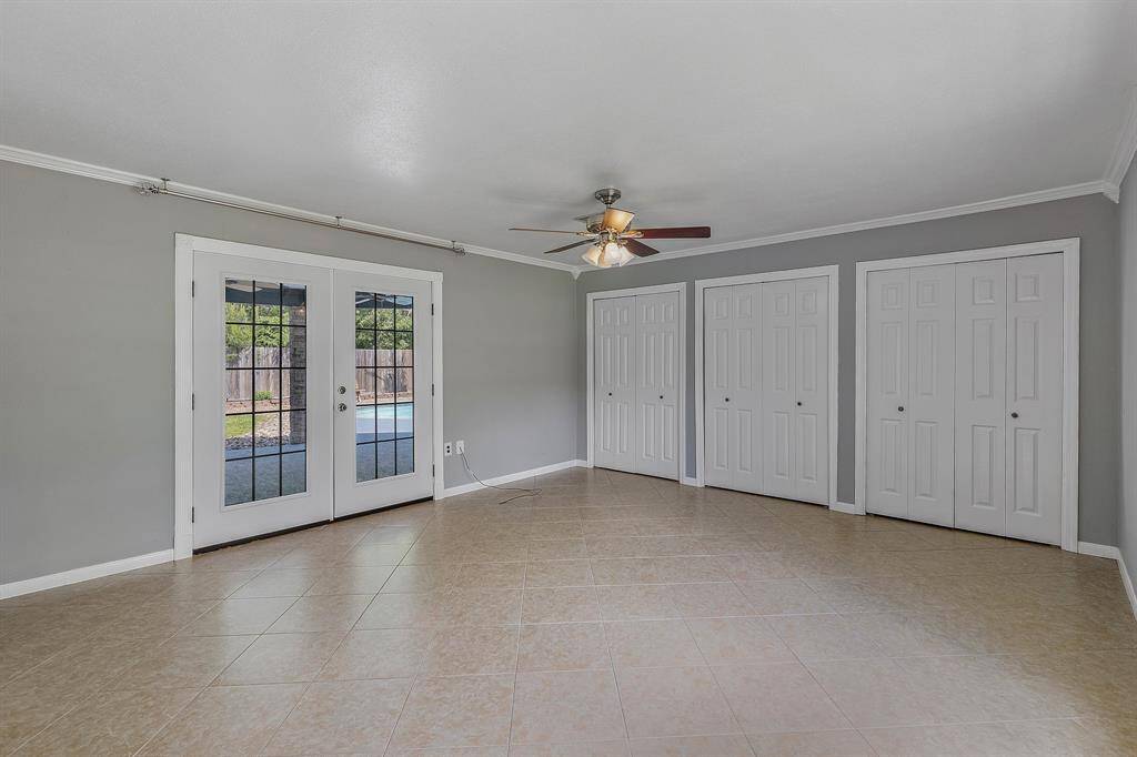 Step through elegant French doors from the primary suite onto a covered patio that leads to the sparkling pool—your own private oasis just steps away. Whether you're enjoying morning coffee or an evening swim, this seamless indoor-outdoor flow brings luxury and tranquility to everyday living.