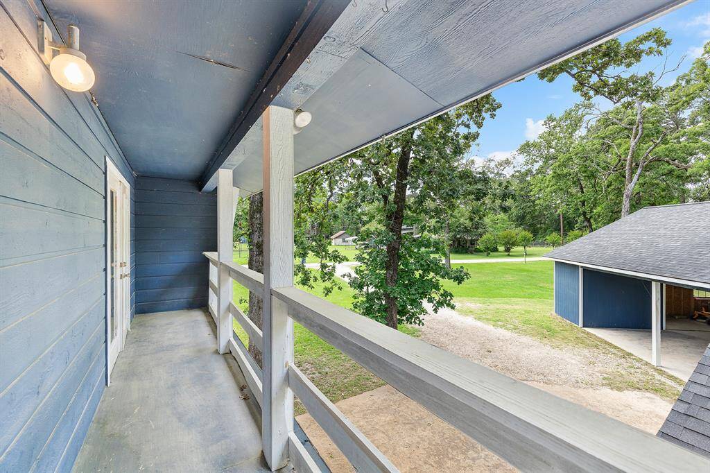 Upstairs, the secondary bedrooms share access to a charming front porch balcony—a perfect spot to enjoy morning sunshine, evening breezes, or simply take in the view. This thoughtful outdoor touch adds character and a sense of retreat to the upper level.