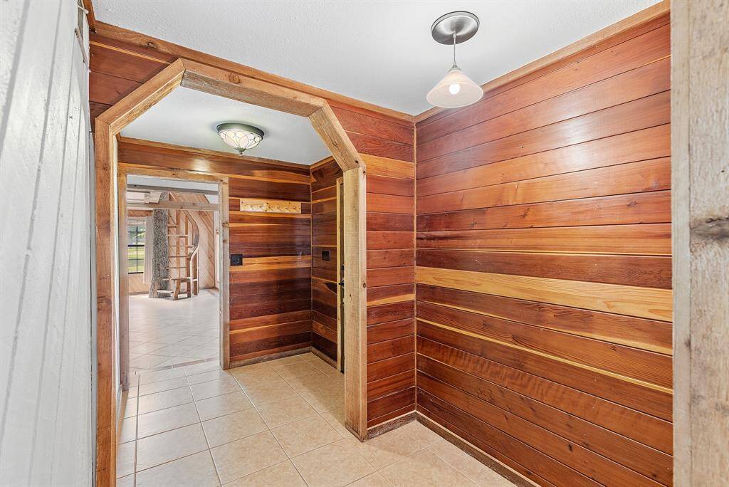 Step through the formal entry and into a beautifully designed living space that exudes character and charm