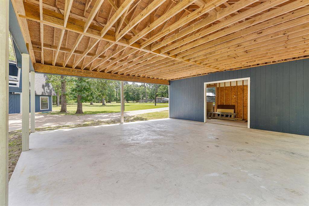 Spacious 30x36 covered parking area—perfect for your RV or boat—with additional storage space that’s ideal for hosting gatherings or easily enclosed to create the workshop of your dreams.