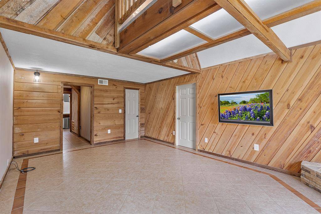 Step into a one-of-a-kind family retreat where rustic charm meets natural elegance.