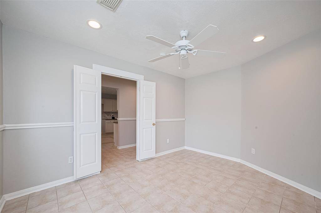 Fourth room with French doors
