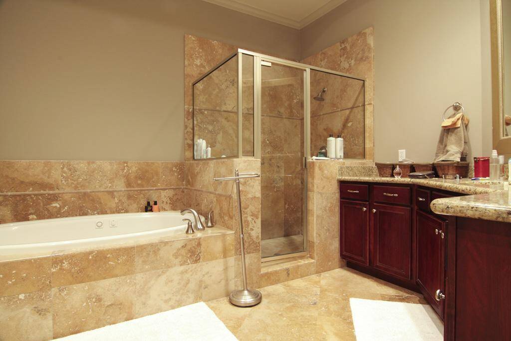 Large jetted bathtub and separate walk-In shower