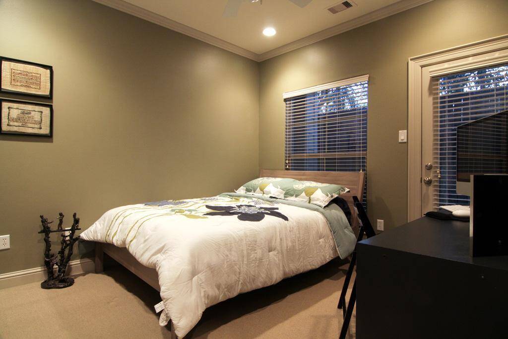 Secondary bedroom with plush carpet