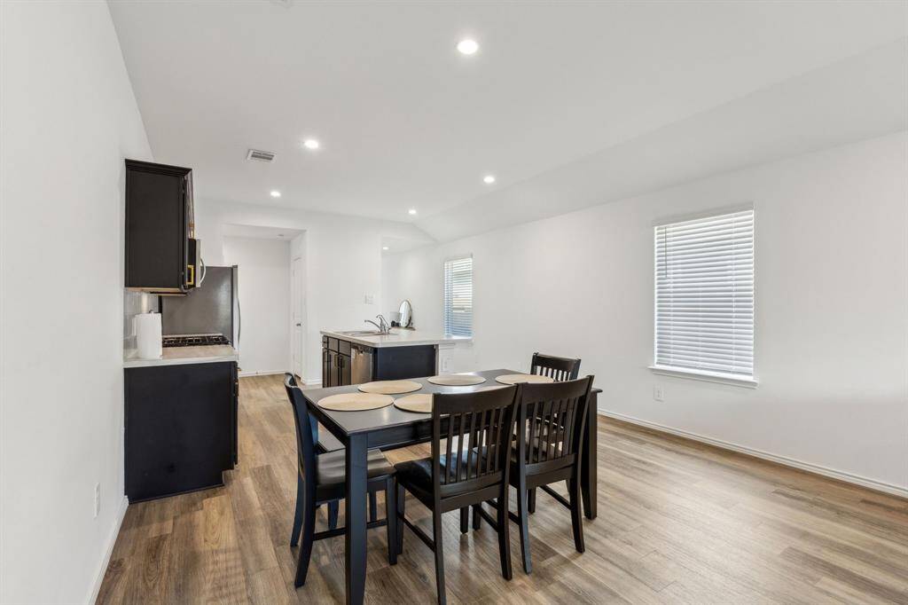 Dining area is open to the kitchen.