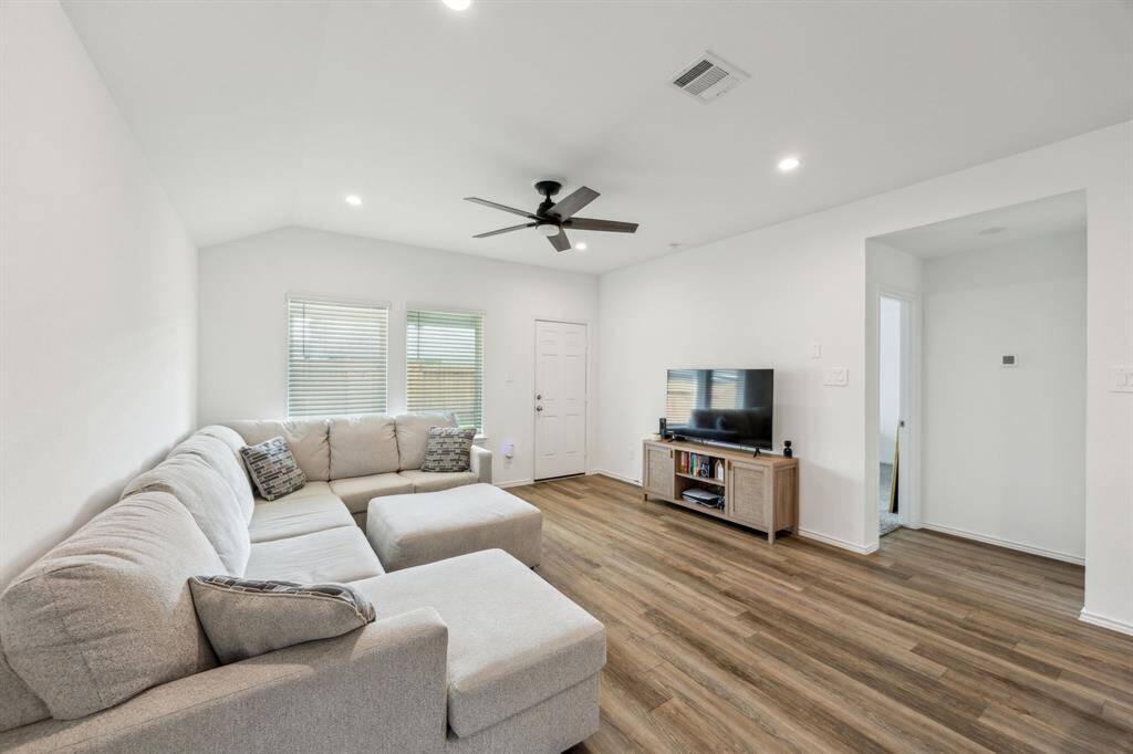 This amazing open floor plan is great for entertaining! Featuring amazing natural light that creates a bright and airy space!