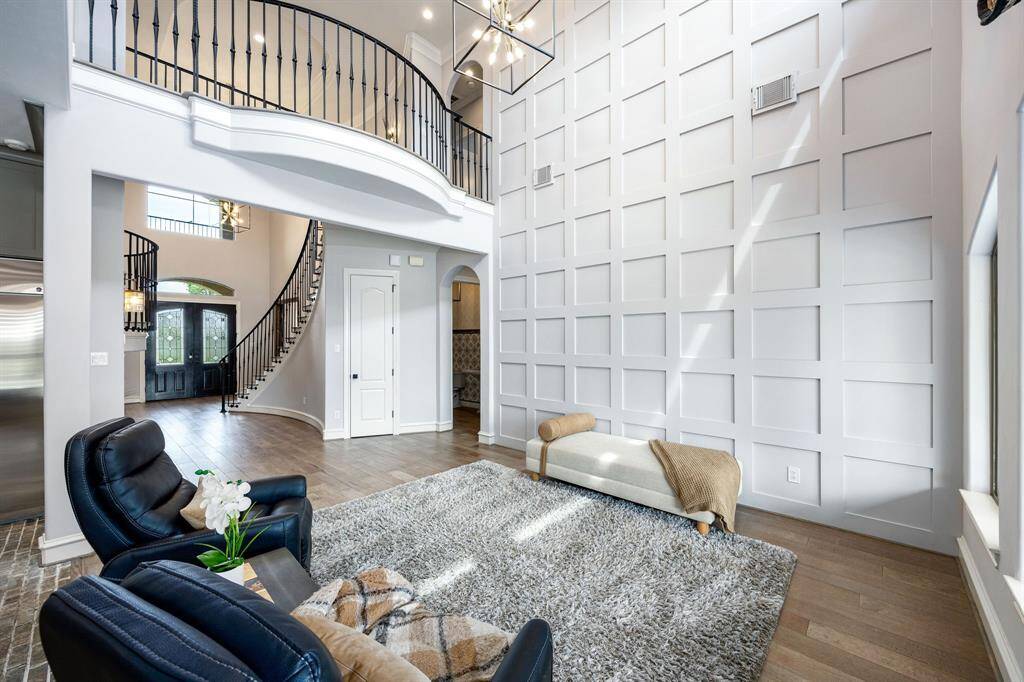 loft overlooking both the family room and foyer