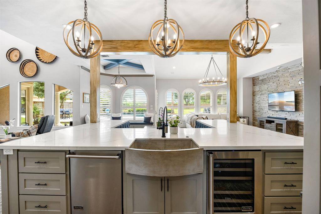See it all from the kitchen which is open to family room, breakfast and living rooms