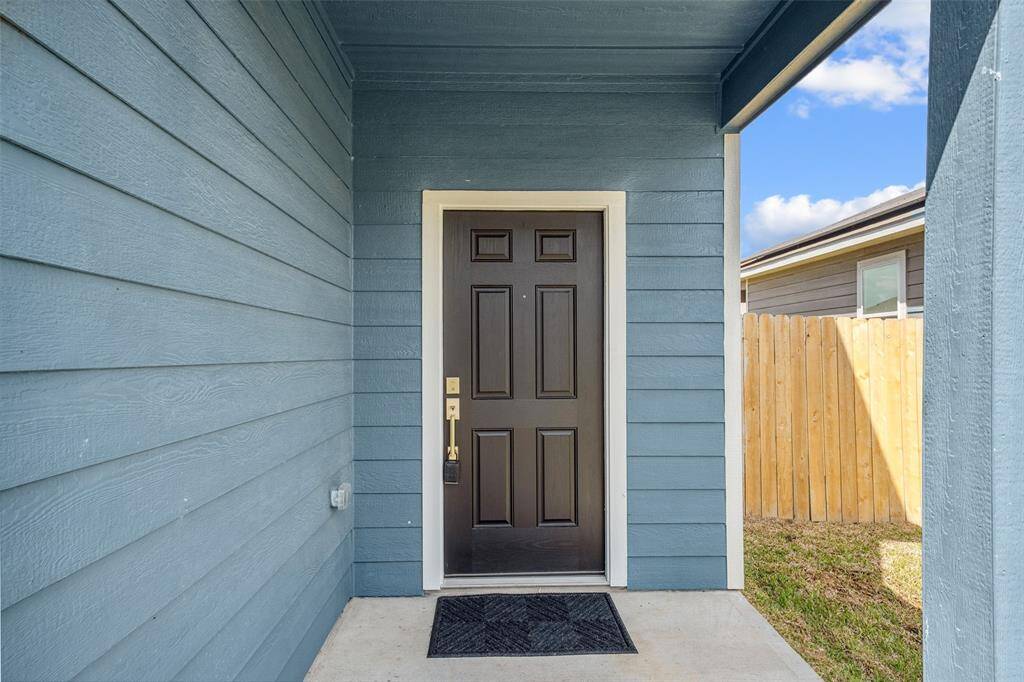 Freshly painted front door and new handle and lock