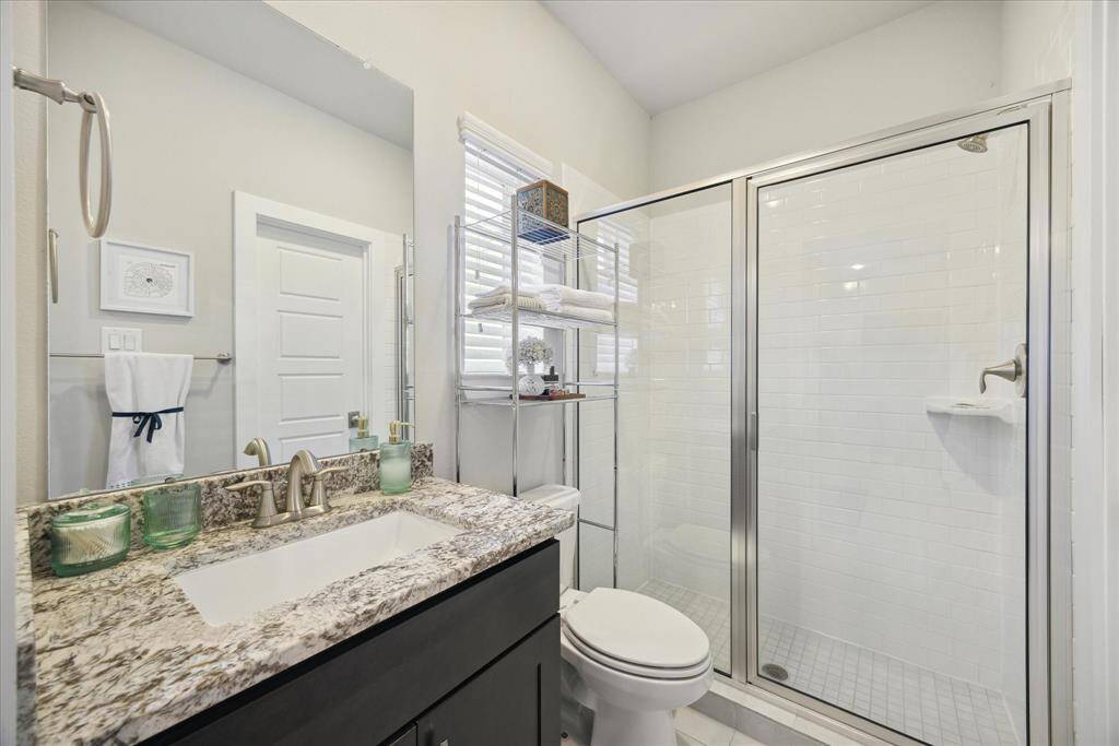 First bath with walk-in shower.