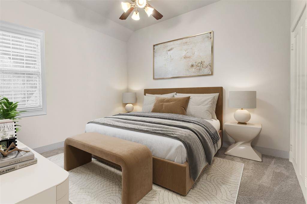 Fourth bedroom features awindow and plush carpet. *Photo is virtually staged*
