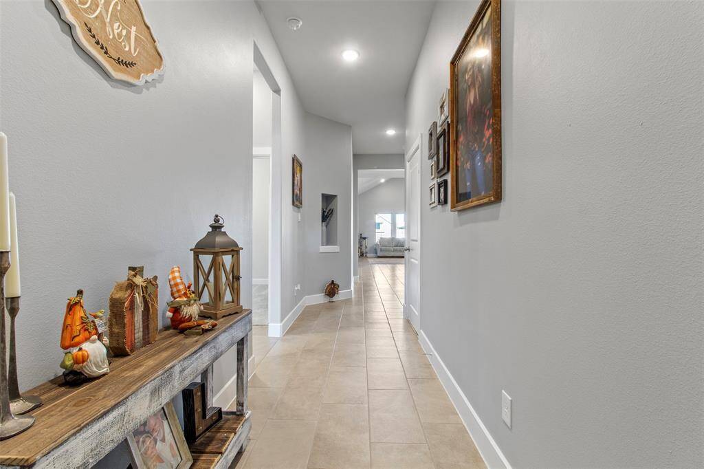 Step into this home, where an inviting entryway sets the tonefor a grand living experience.