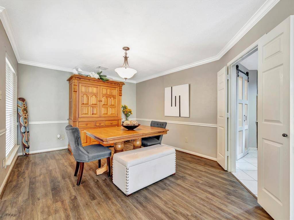 French doors leads tp the Kitchen and utility rom.