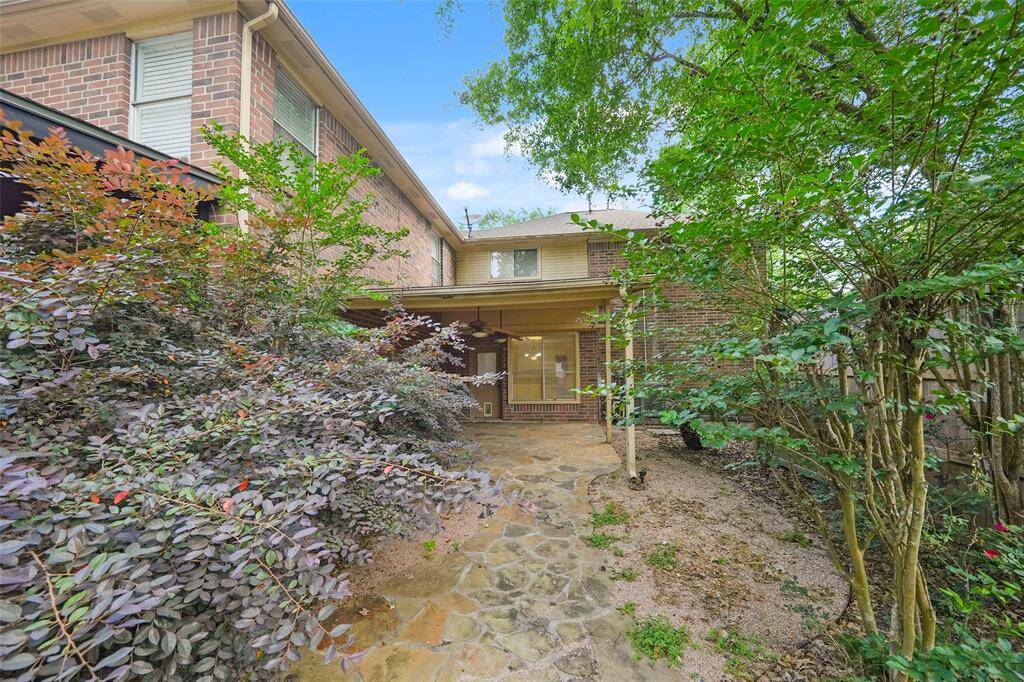 Beautiful, lush, private backyard with new fence