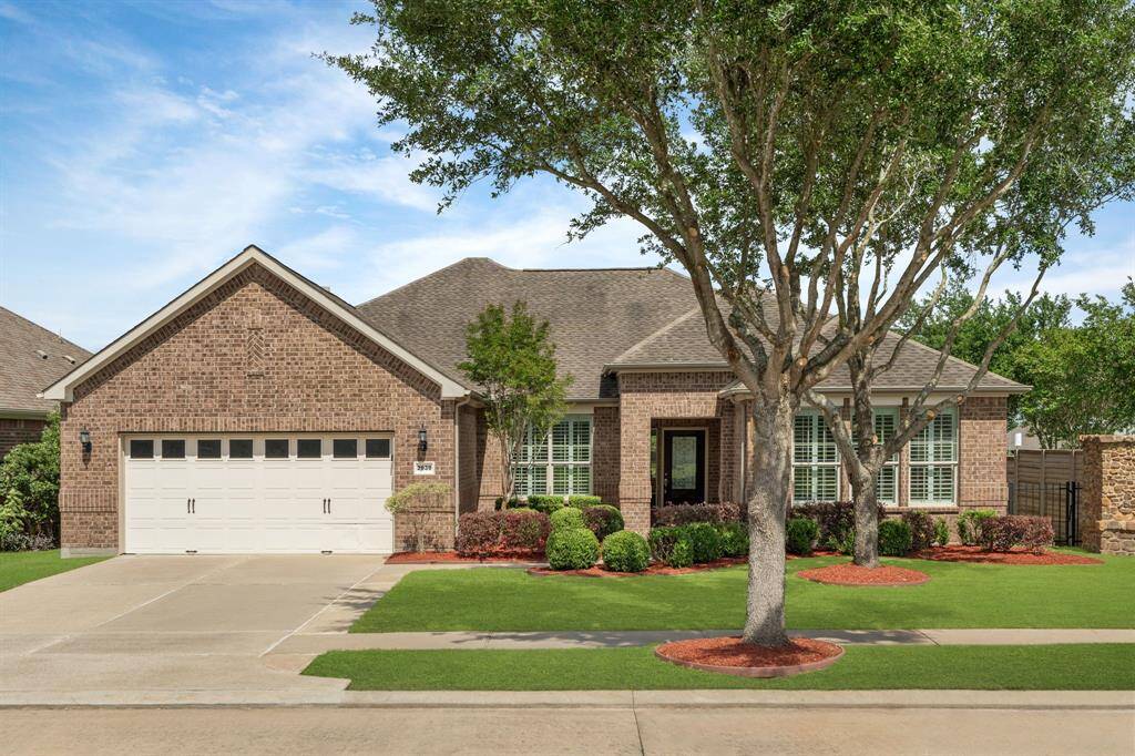 Sought-after Dunwoody floorplan nestled on a charming corner lot with two graceful oak trees and timeless plantation shutters—just a short, scenic stroll to the Lakehouse.