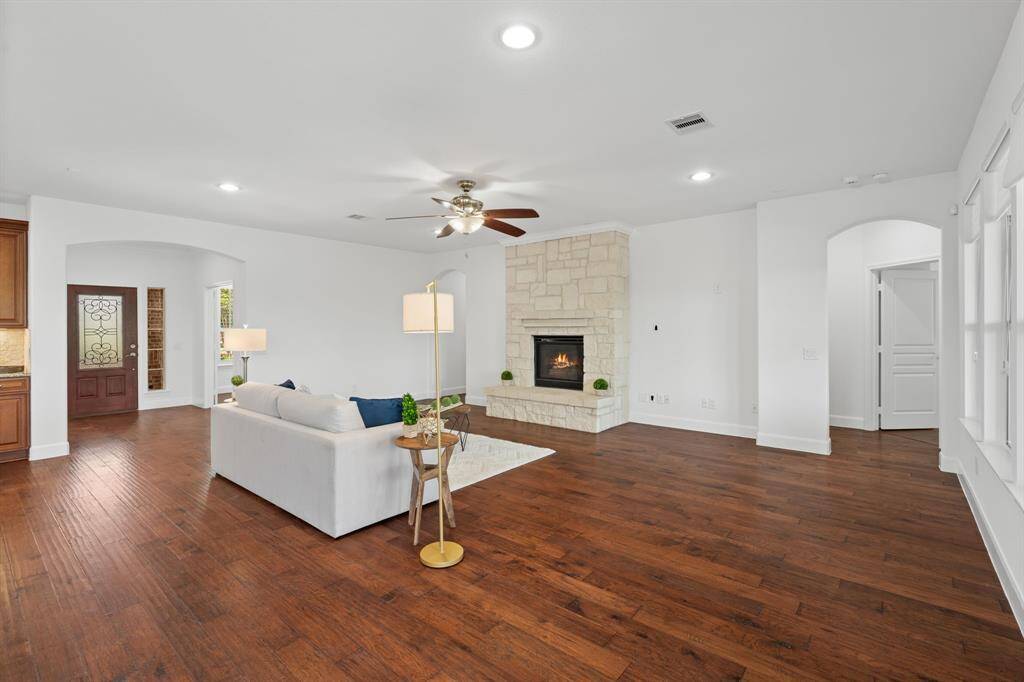 The spacious gathering room offers multiple options for furniture placement, allowing you to create the perfect layout to suit your style and needs.