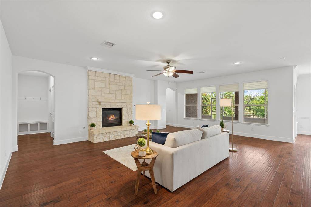 The archway leads to the convenient MUD bench, offering a perfect spot to drop your things as you enter from the garage.