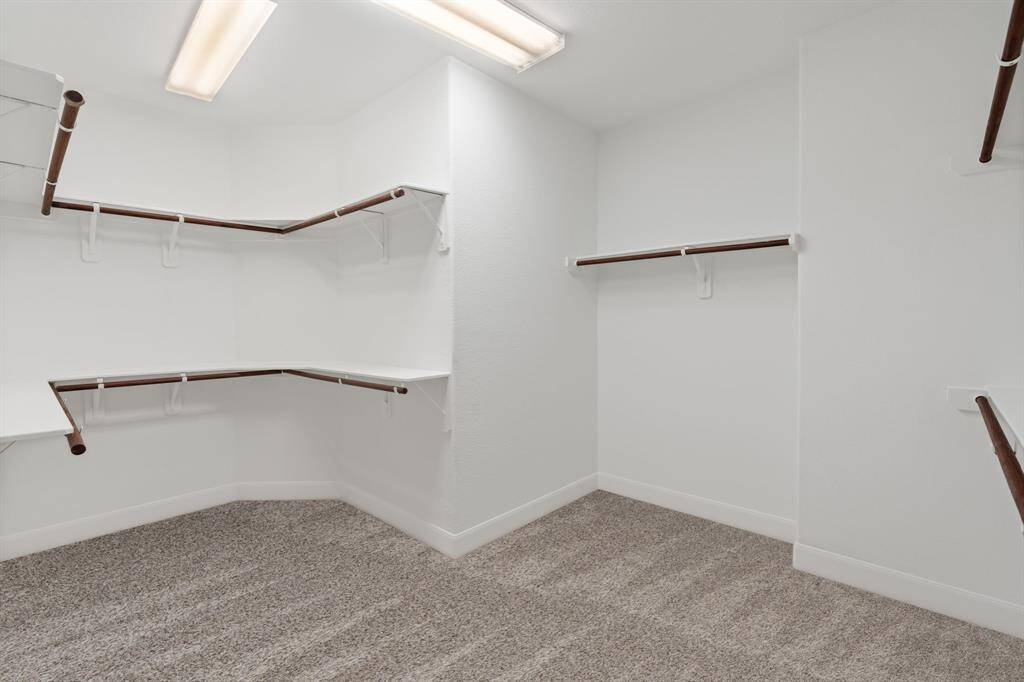 The spacious, well-designed closet is a standout feature of this home, offering ample storage and organization space that everyone will appreciate.