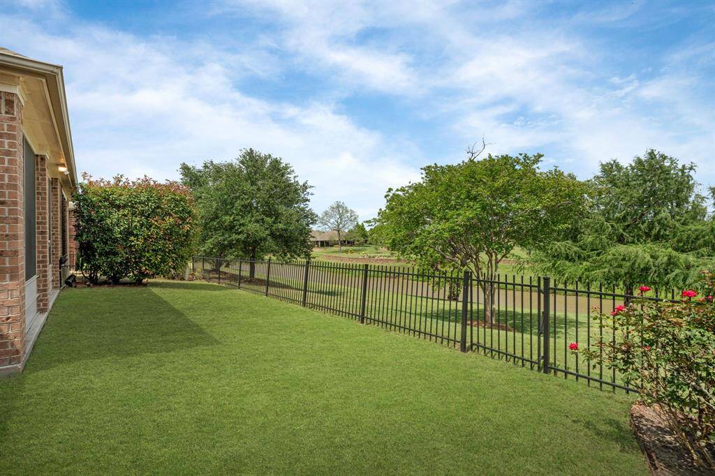 This photo has been enhanced with grass to highlight the potential of the beautiful outdoor space.
