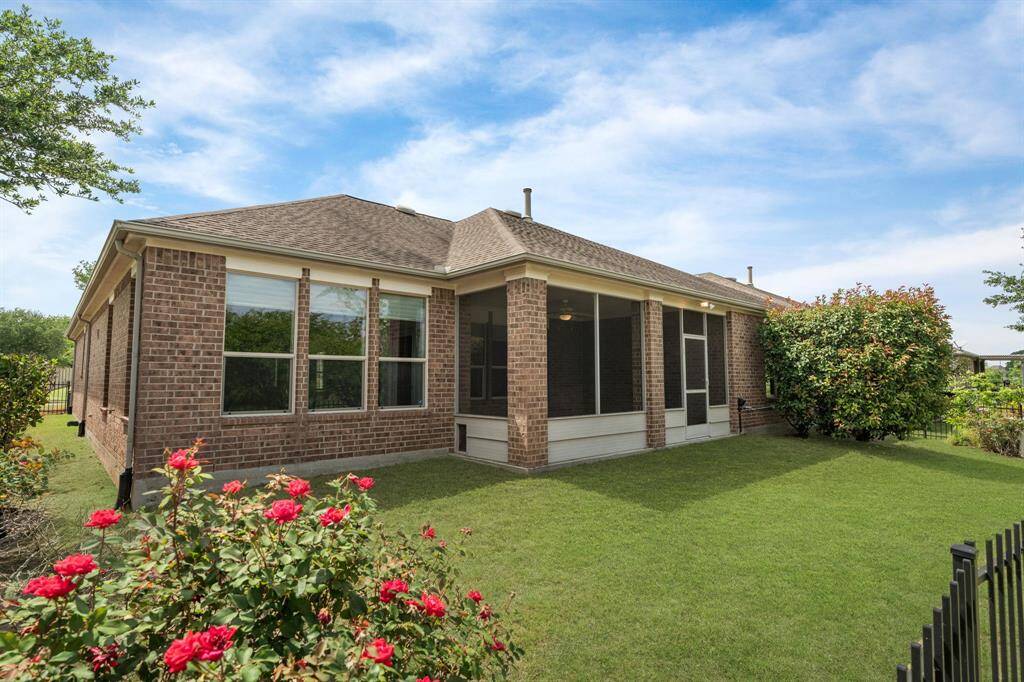 The grass in this photo has been digitally enhanced to showcase the full potential of the yard.