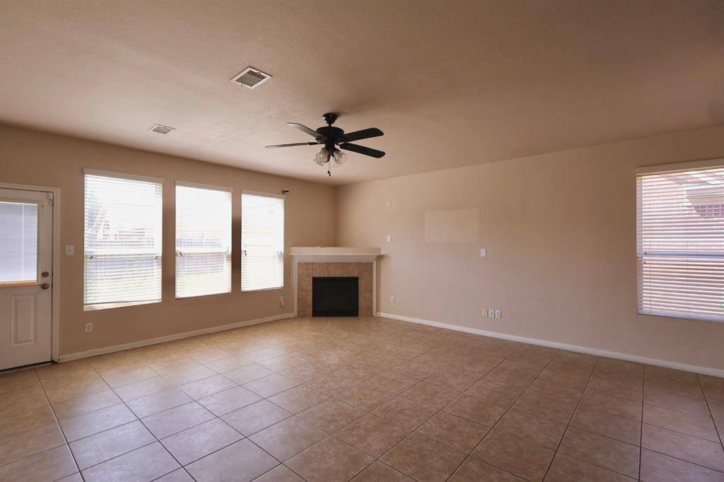 Expansive living room with tile flooring