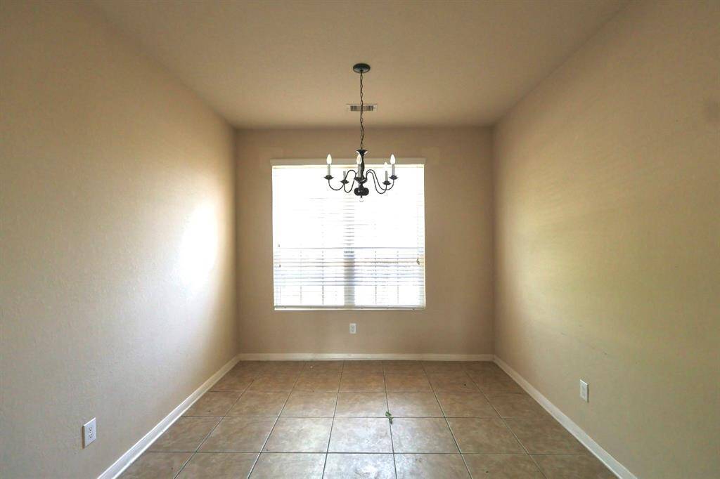 Well lit formal dining room